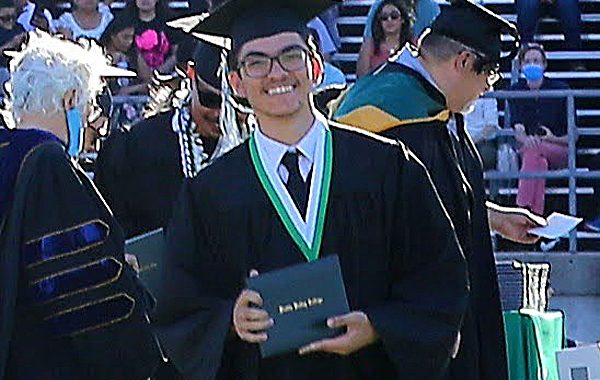 Eli Vu graduated from Clayton Valley Charter this spring a week after he collected his first college diploma