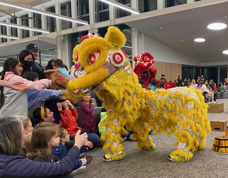 Dancing lions usher in the Lunar New Year at Pleasant Hill library