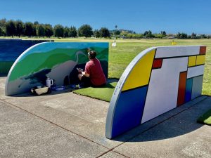 Driving range murals scoring aces with patrons in Concord